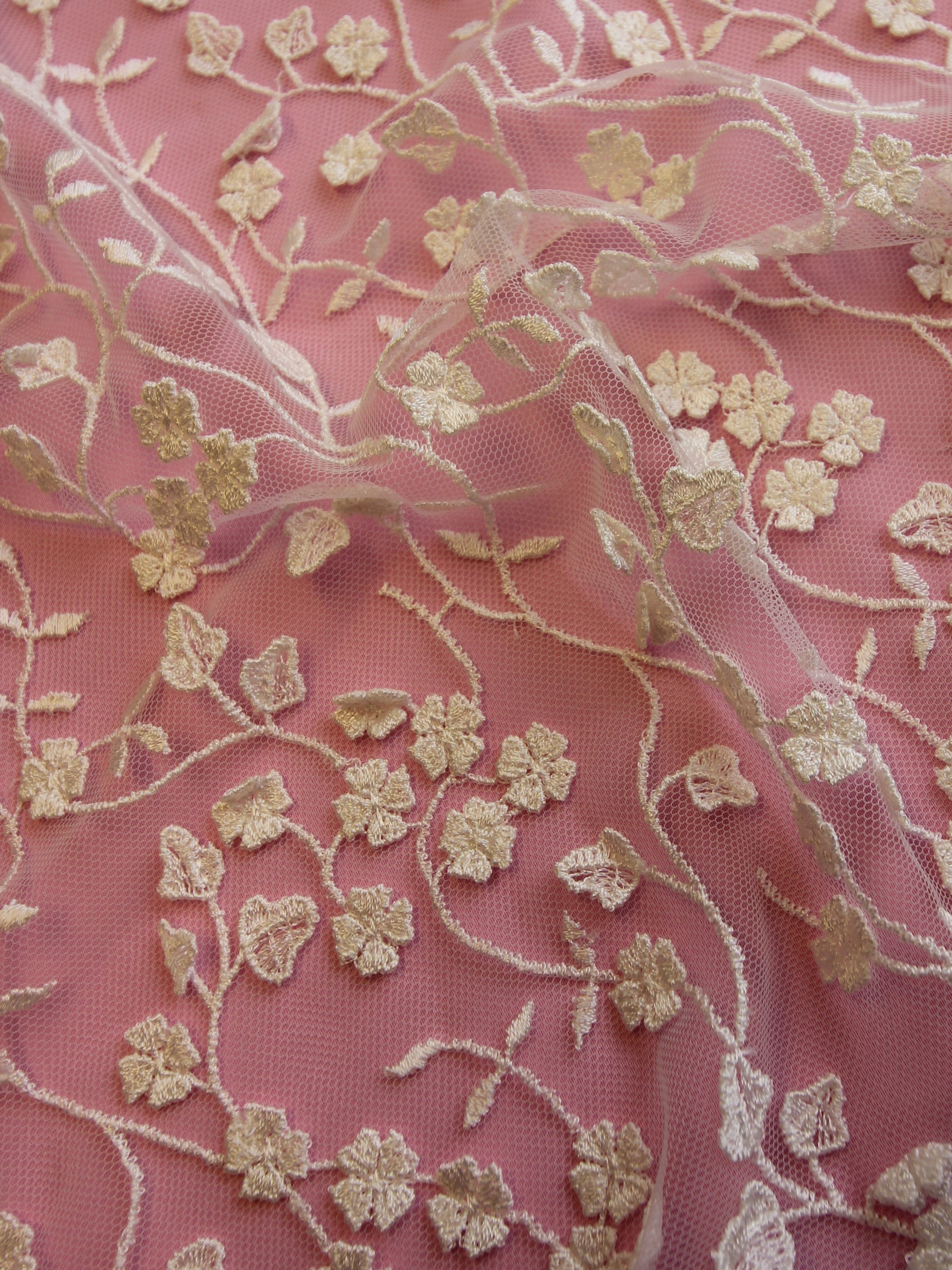 https://www.bridalfabrics.com/cdn/shop/products/ivory-embroidered-lace-adebola-close-up_1800x.jpg?v=1698936023