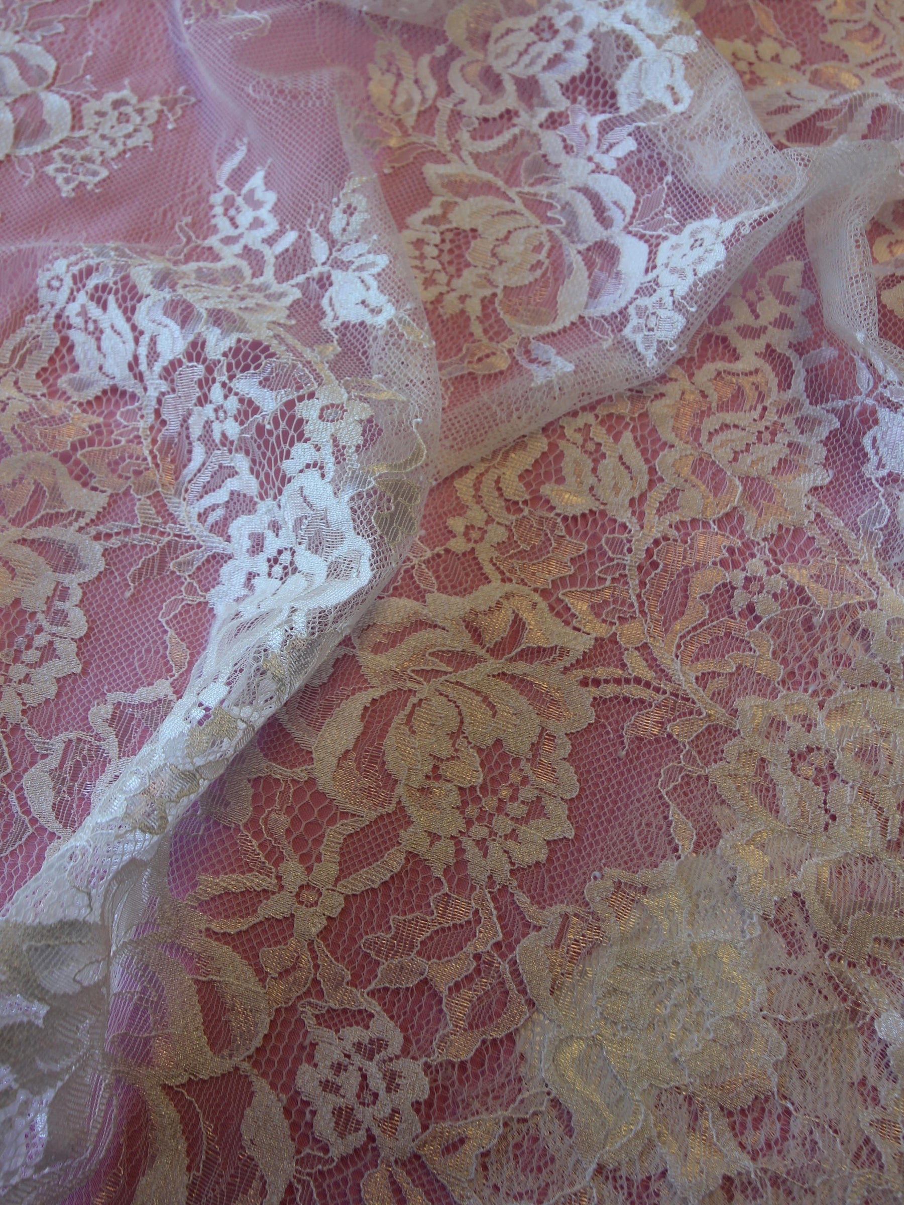 https://www.bridalfabrics.com/cdn/shop/products/ivory-raschel-lace-capri-close-up_1800x.jpg?v=1691758577